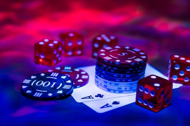 Live dealer handling cards at No Commission Baccarat table
